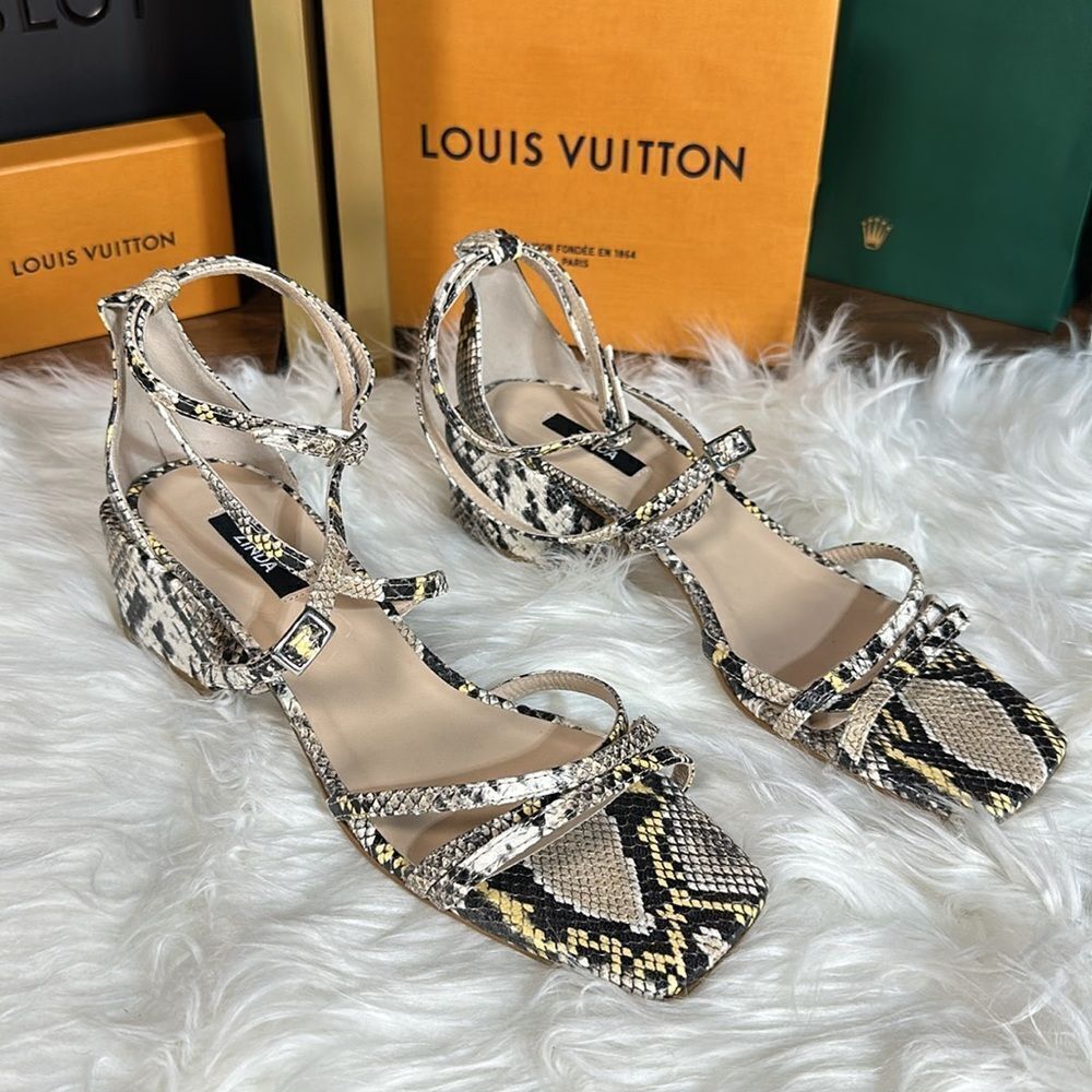 Unworn snake print wedges